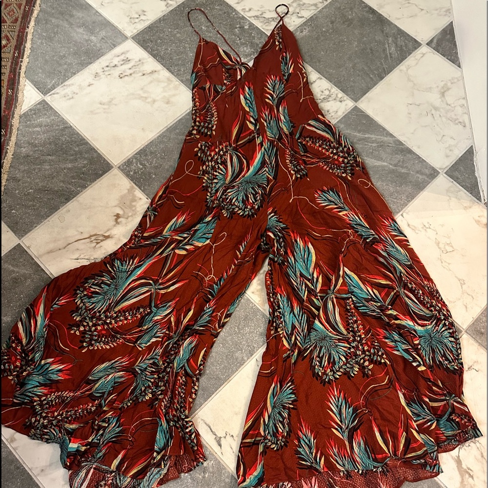 Free people tripical maxi jumpsuit, rust palm boho style. Wide legs